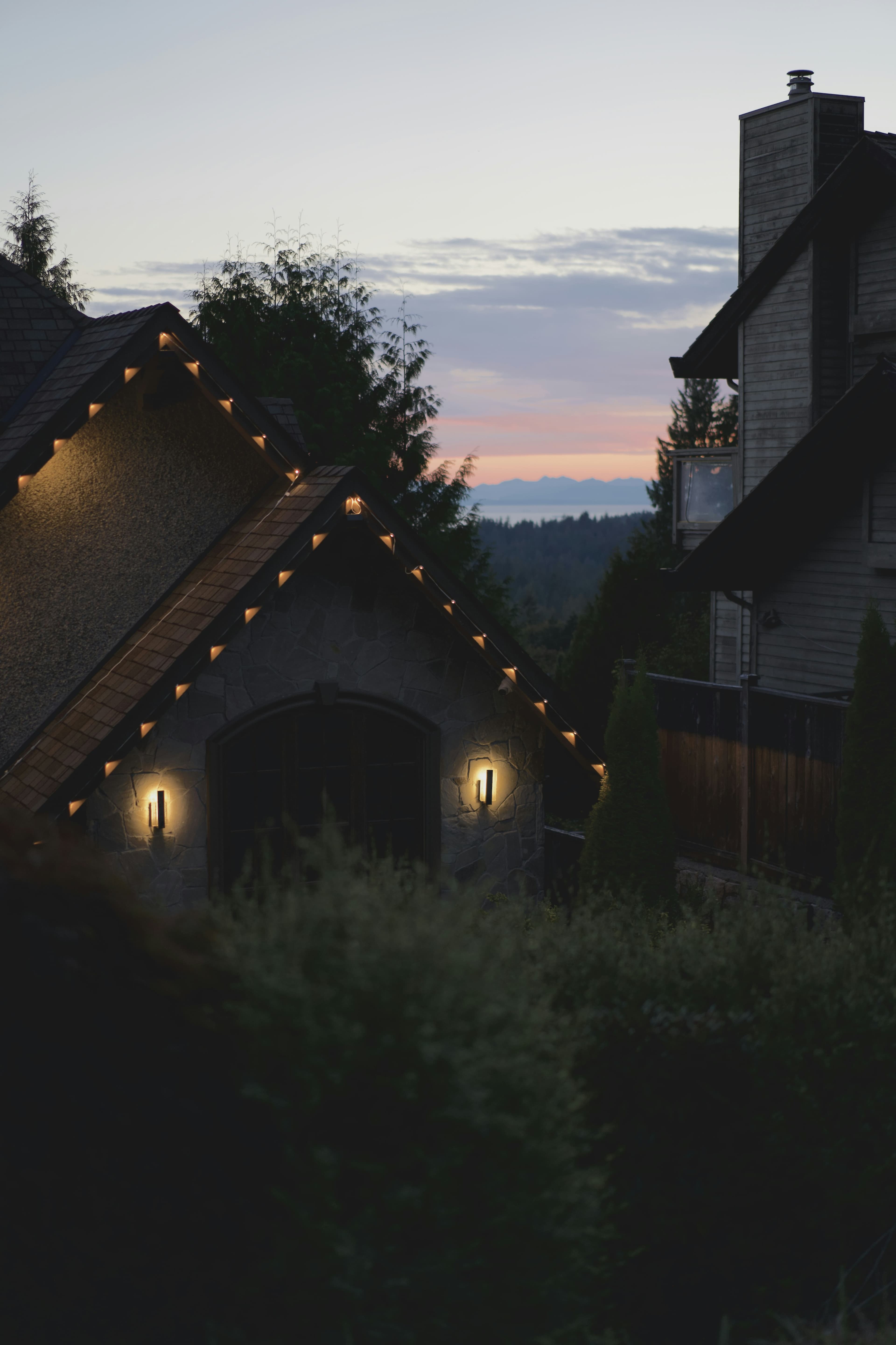 Stone house glowing at dusk
